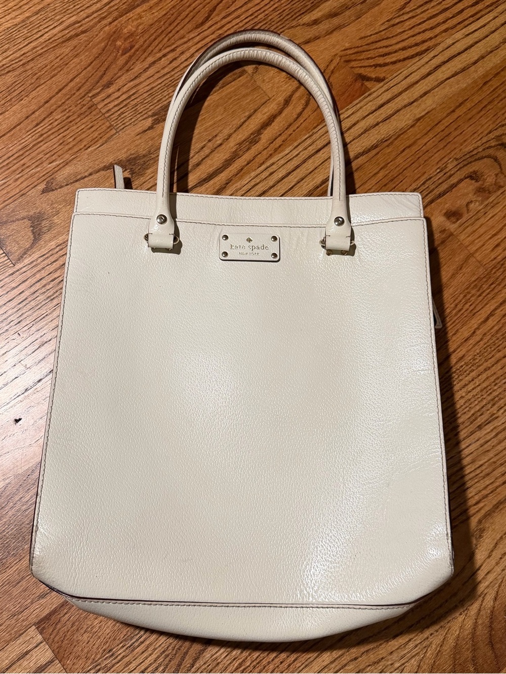 kate spade Cream Pebbled Leather Tote with polka dot interior